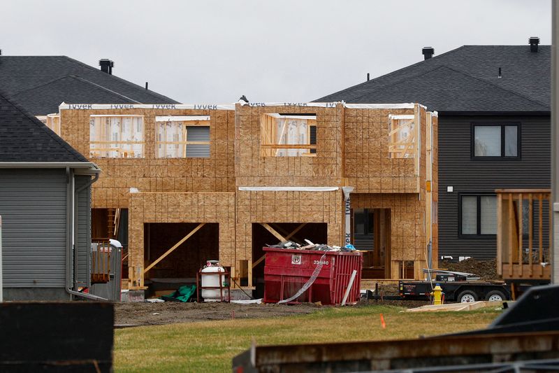 FILE PHOTO: Houses are seen for sale and under construction in a neighbourhood of Ottawa